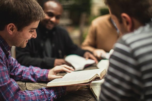 Group of church goers talking about stewardship in the Bible