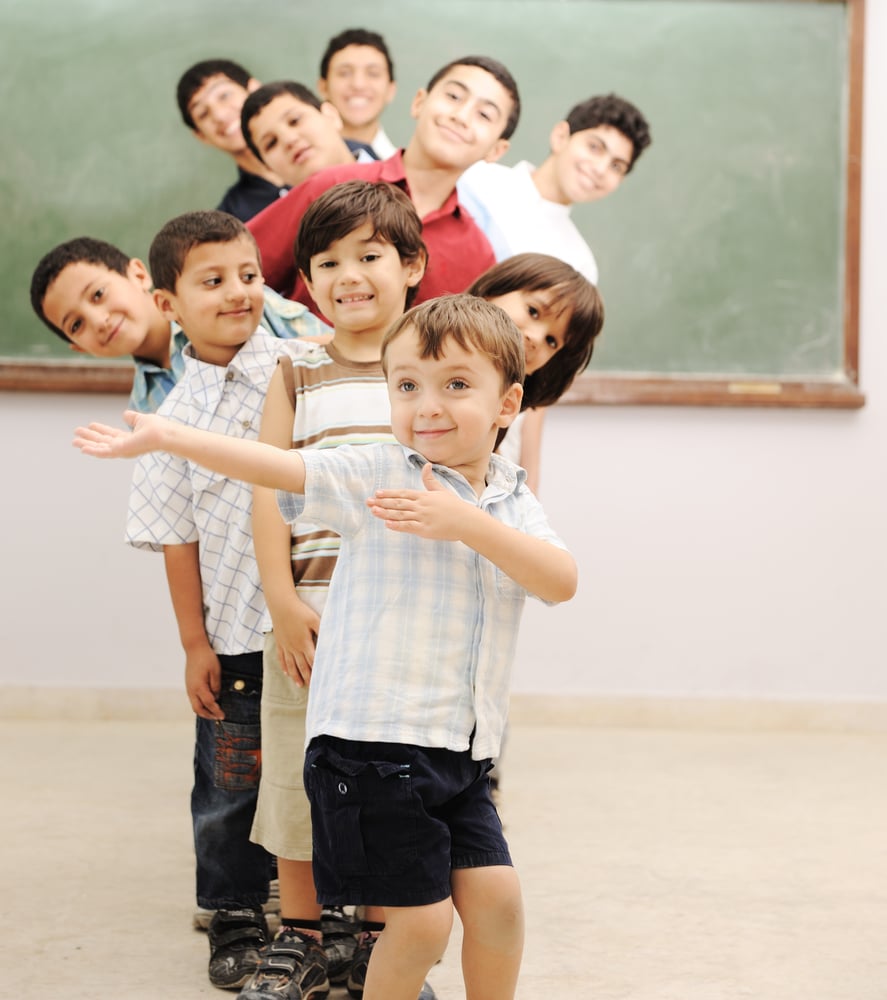 Children at school in row