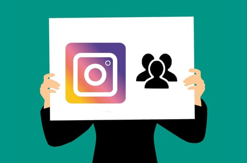 Icon of Person Holding Instagram Icon