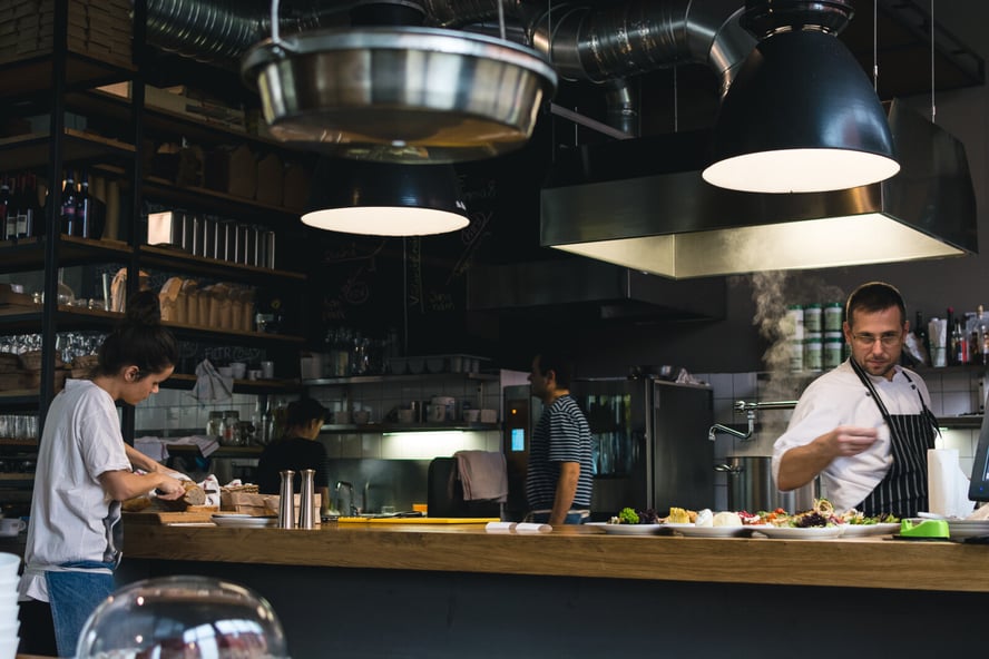 Image of workers at a diner