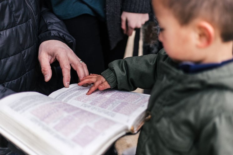 Kid Reading Bible at Church Youth Day