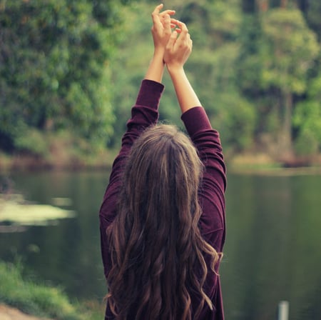 Lady Praising Controlling Church Members by Pond