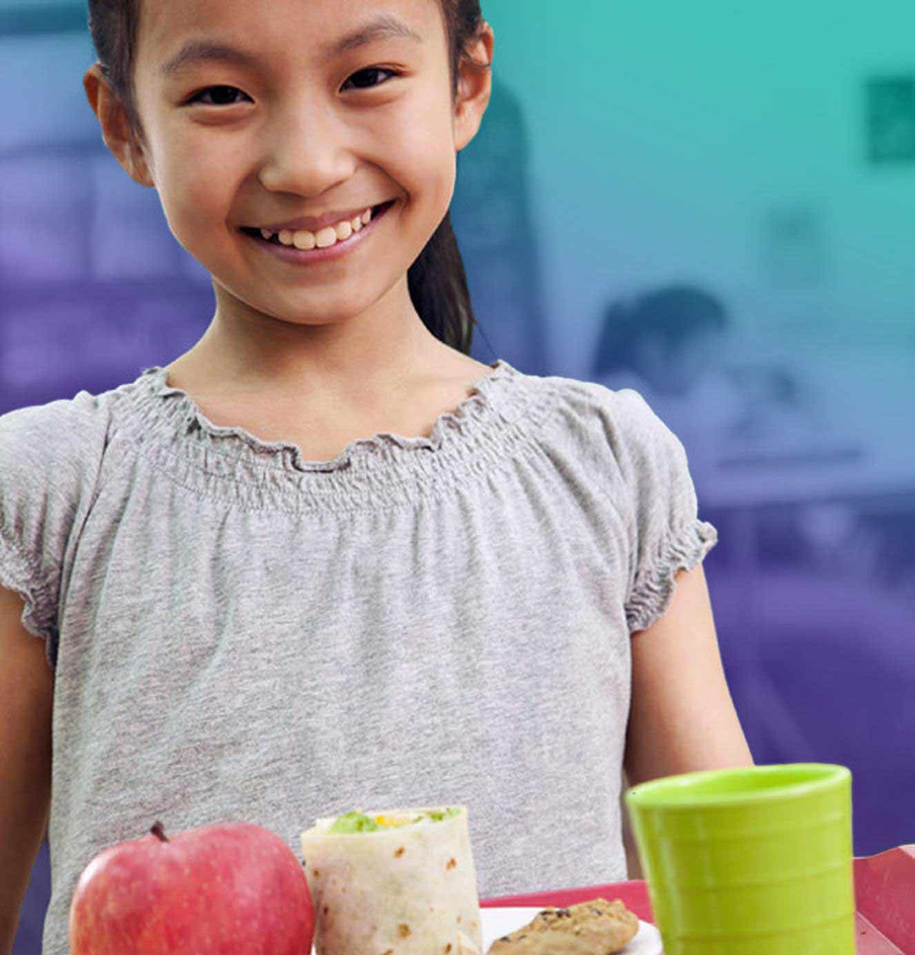 girl holding lunch tray