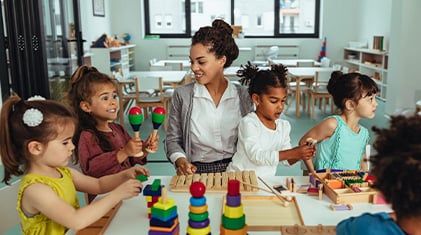 children and teacher at child care centere