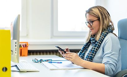 woman calling lead at computer