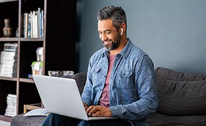 man-registering-on-computer