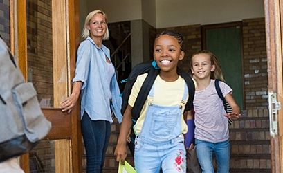 teacher and students outside