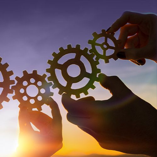 hands-holding-gears