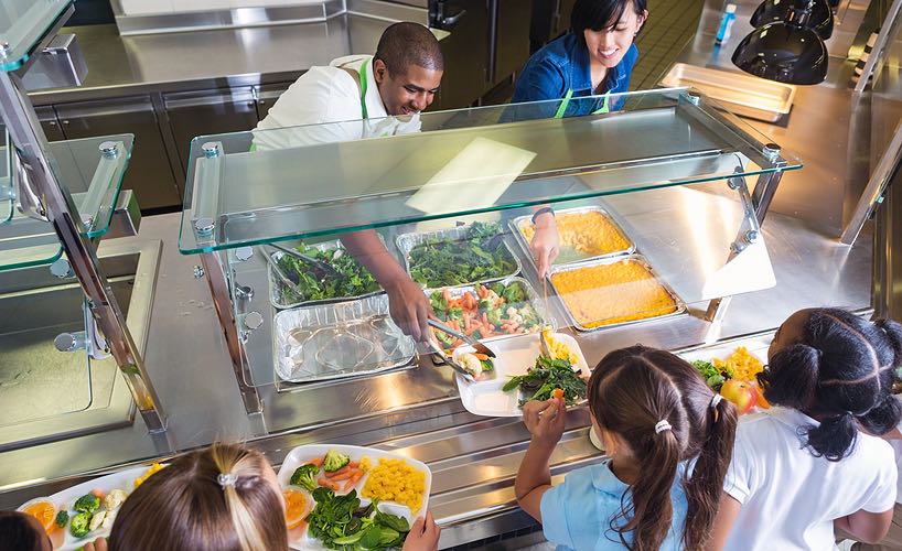 students in cafeteria lunch line