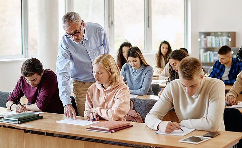 teacher with students
