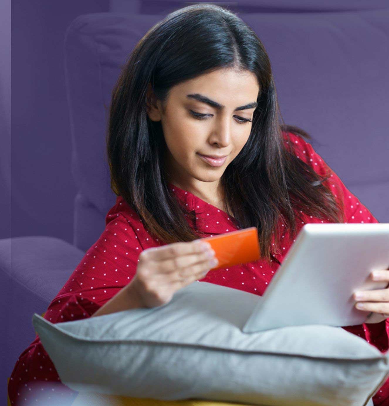 woman paying school fees in pajamas