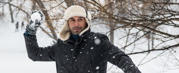 Man Throwing Snowball