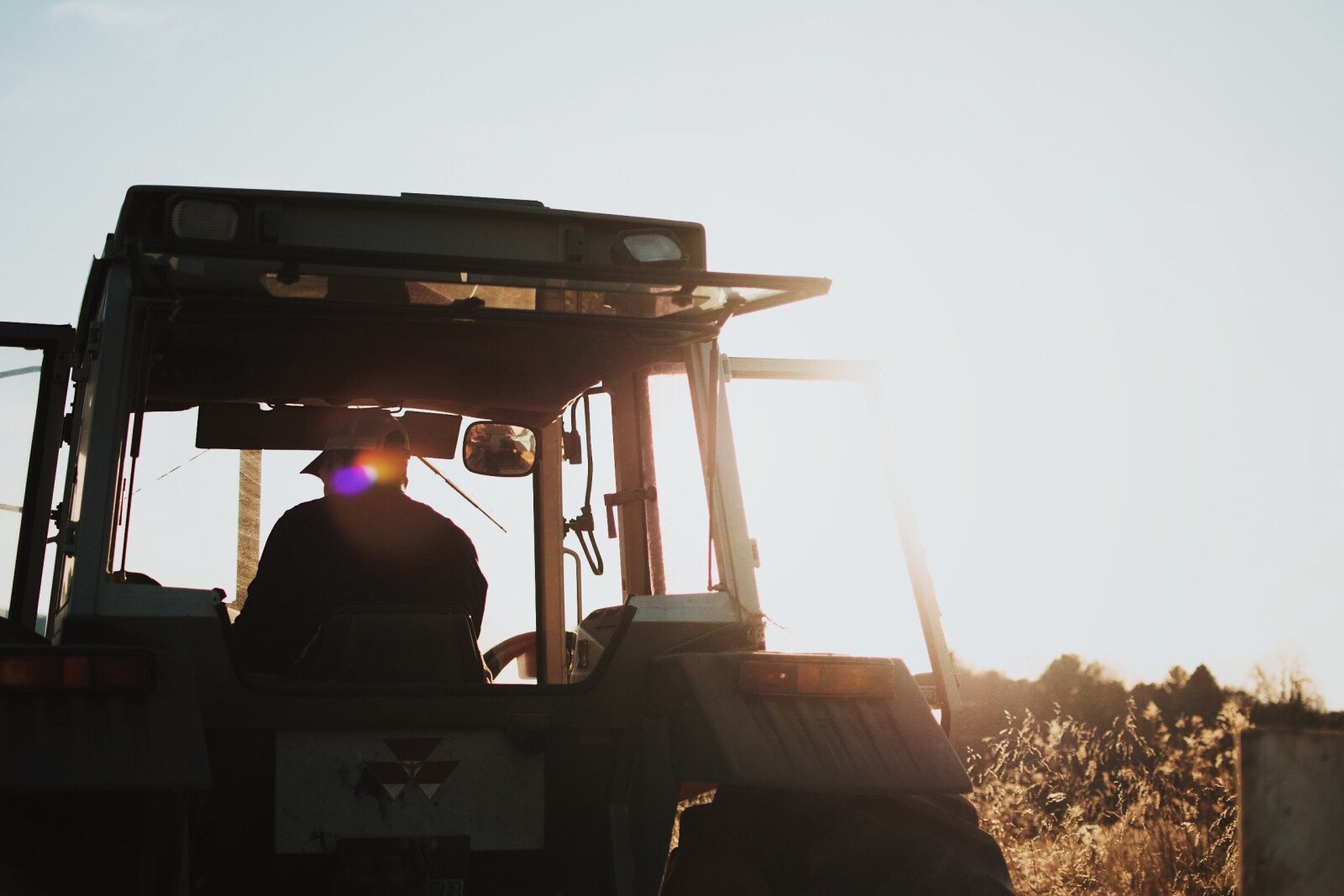 Man on Tractor Operating Homecoming Hayride