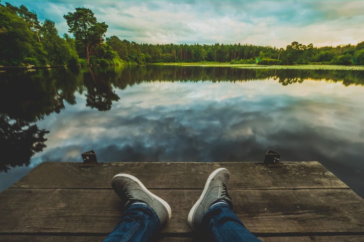 Man relaxing on dock - church conflict resolution blog