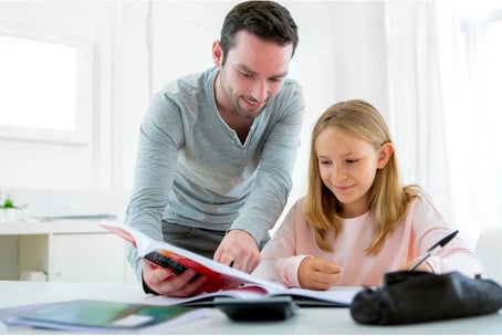 Parent Helping Daughter Out with School Fundraiser