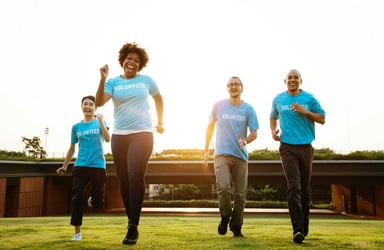 Volunteers in blue t-shirts
