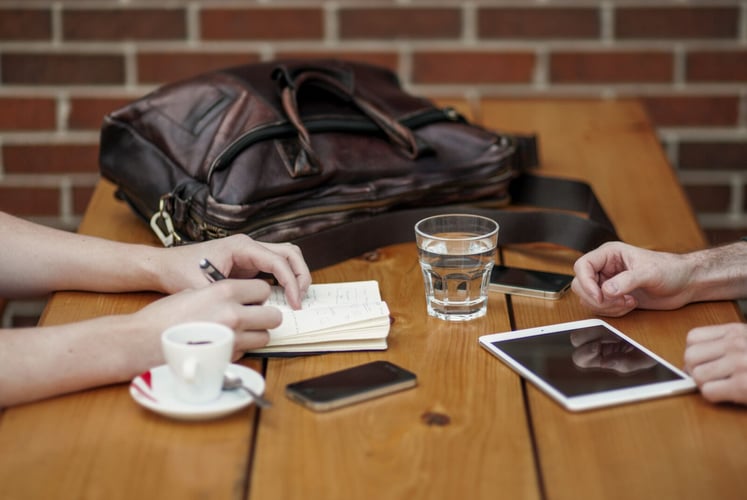 Pastor meeting with disgruntled church member for coffee