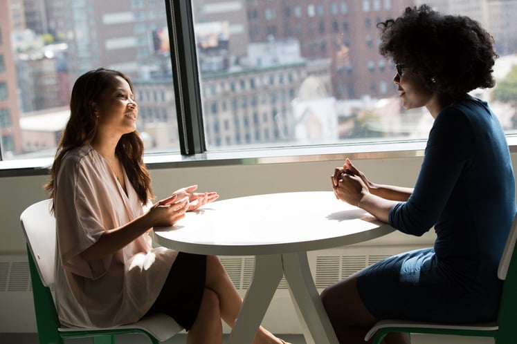 Pastor talking to church bully in private