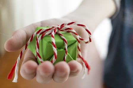 Person Giving a Gift at Church-1