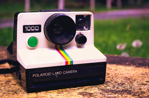 Polariod Camera Decorated to Look Like Instagram Logo