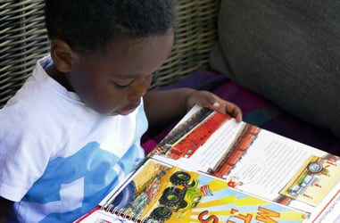 Preschool Boy Doing a Reading Activity