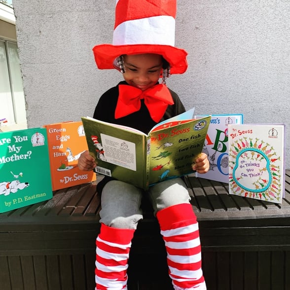 Preschooler Reading a Book in a Storytime Activity