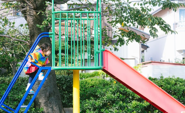 Preschooler playing outside