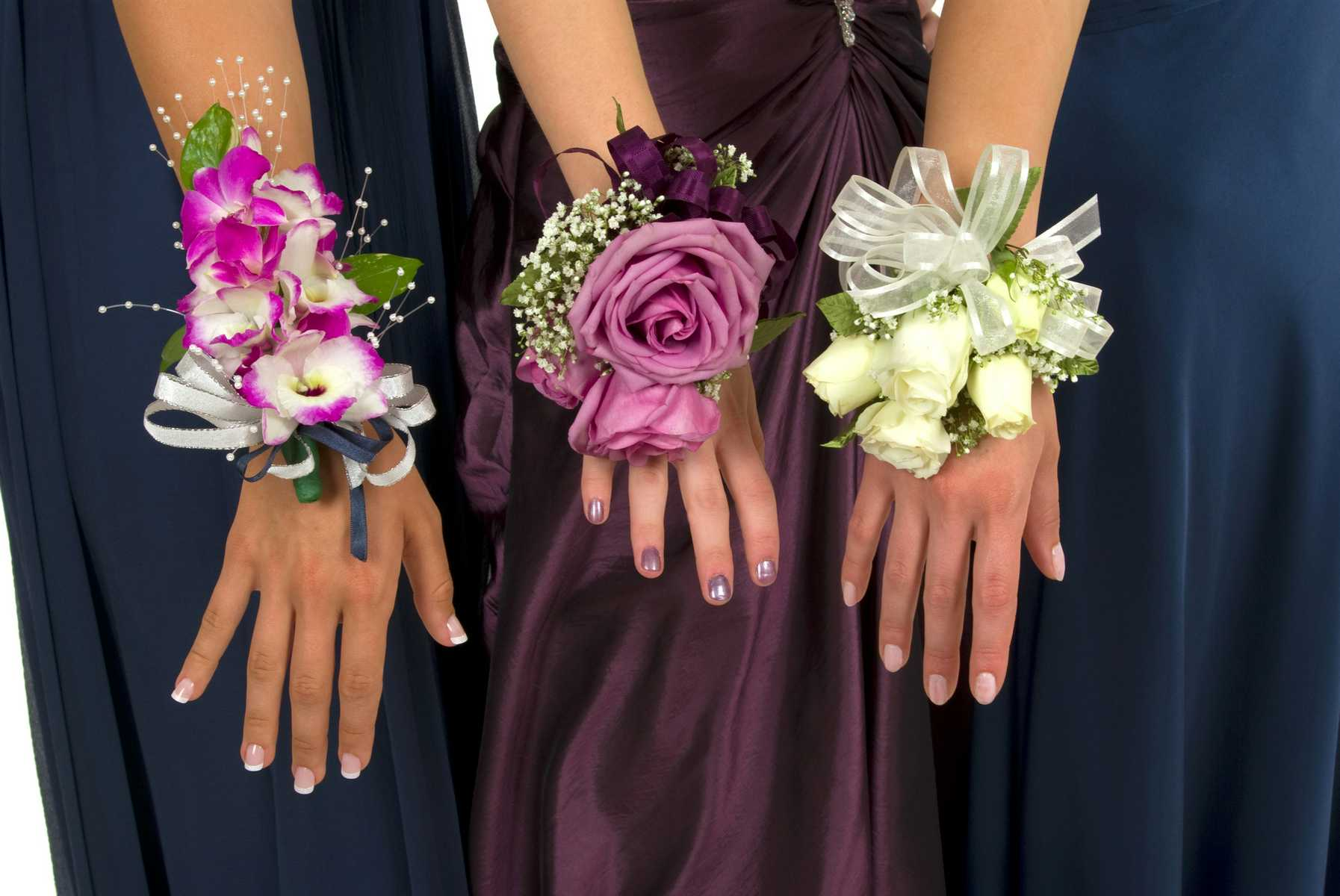 School Homecoming Dance Corsages on Girls' Wrists