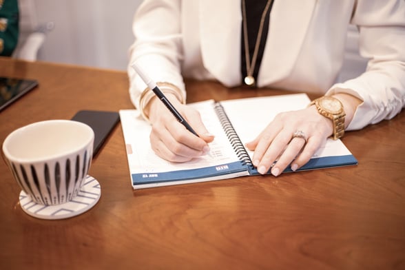 School office worker about to take notes on finances (2)