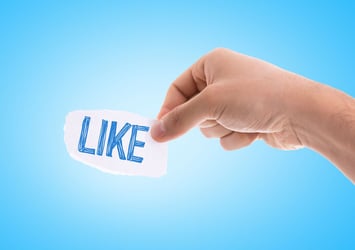 How to Create a Church Facebook Page - Hand Holding a Paper with Like