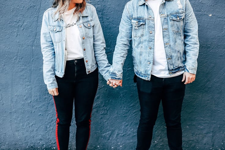 Two Church Volunteers Holding Hands