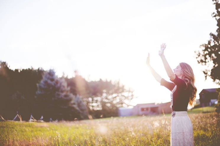 Woman Praying Outside in Sun - Closing Blog