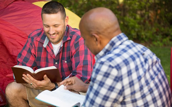 Two Men Smiling During Bible Study