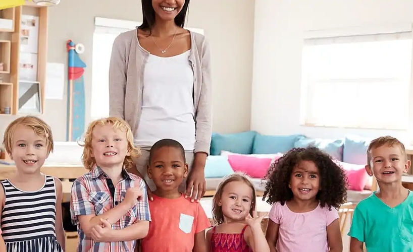 kids and teacher at child care center