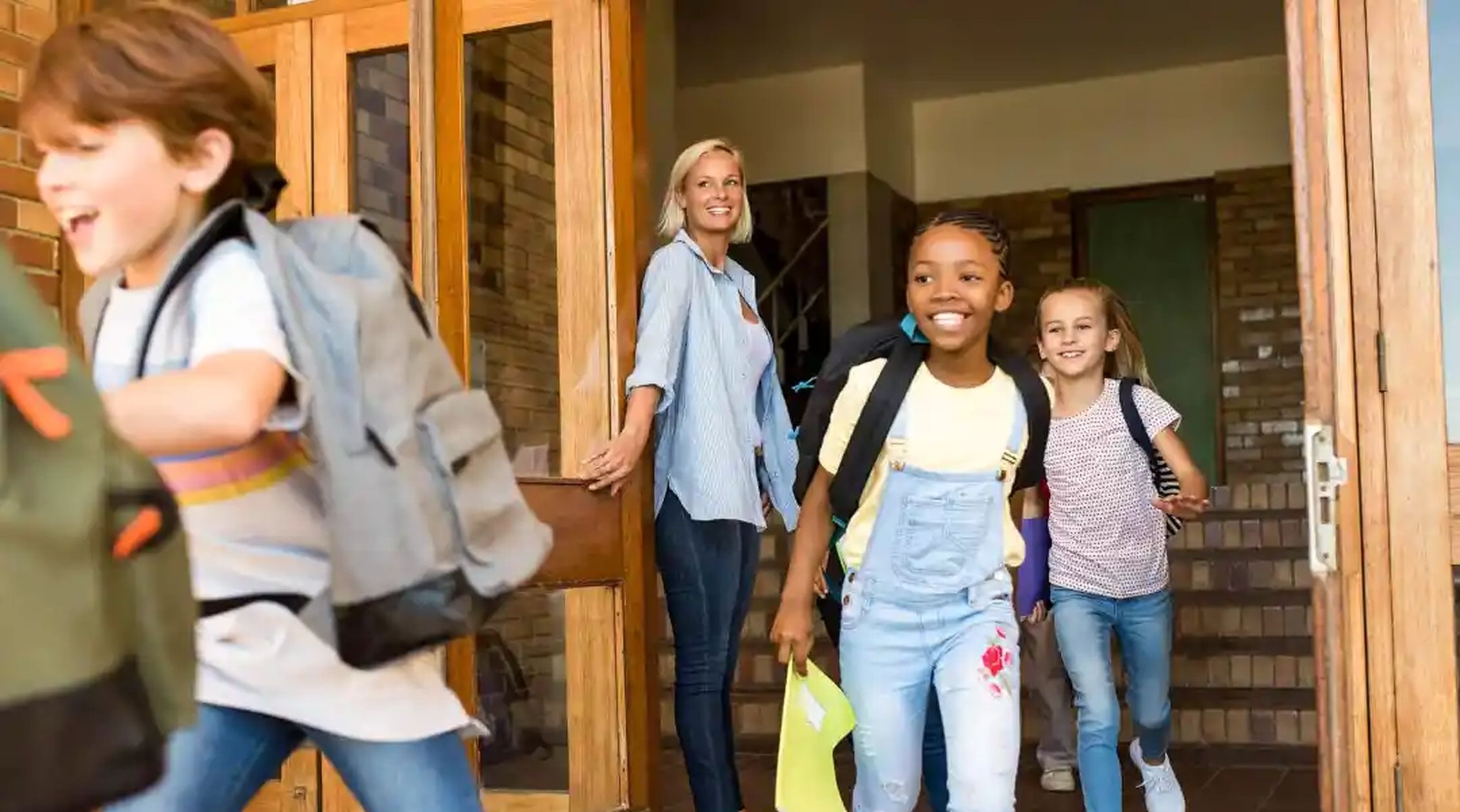 After-School-children-with-teacher-one-column