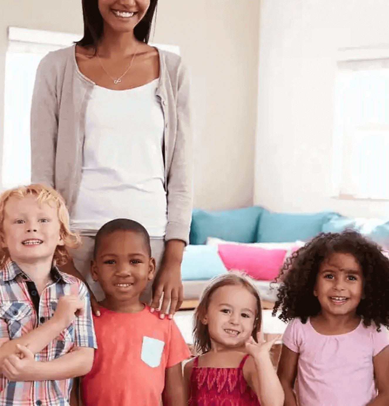 Childcare-enrollment-blog-Woman-posing-with-kids