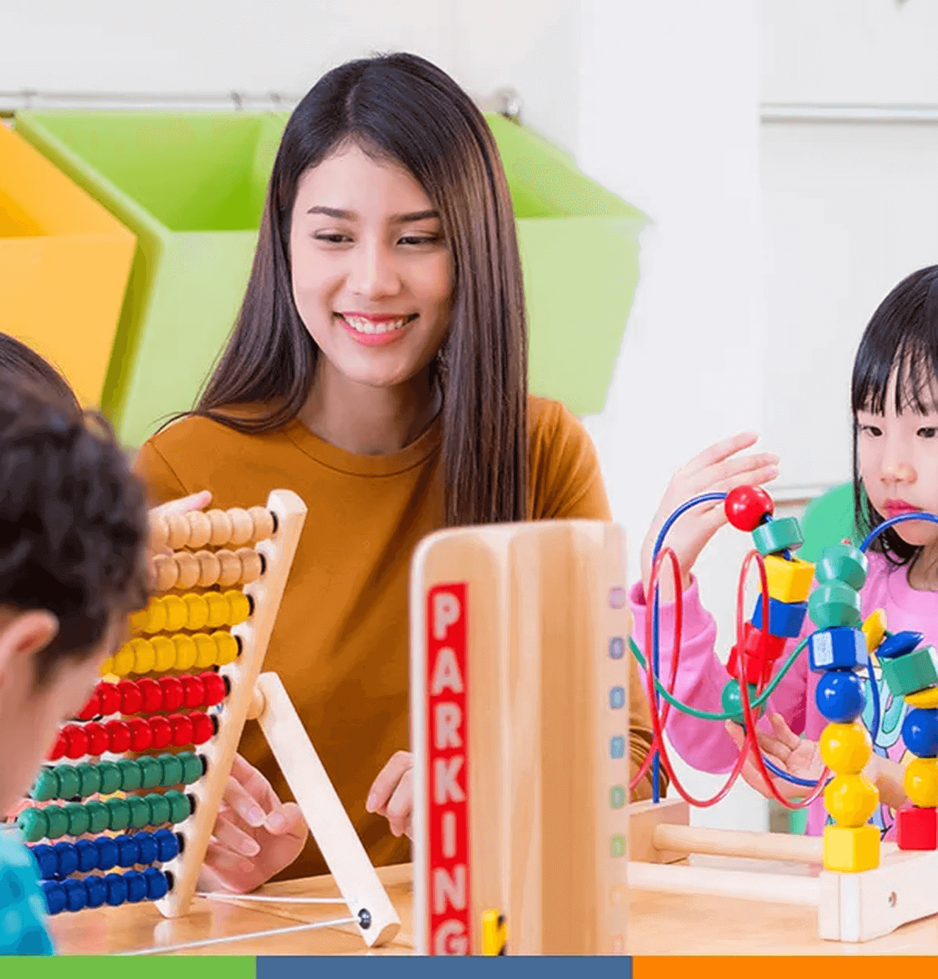 early-childhood-teacher-with-children-at-table-two-column-tall