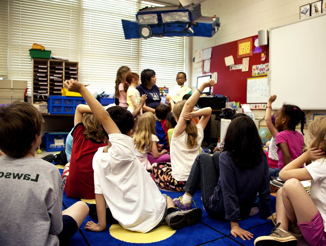 Daycare Center Children Sitting in Classroom