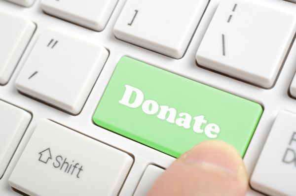 Laptop keyboard with the word "Donate"