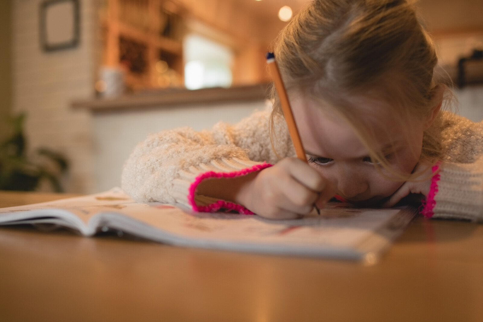 Preschool Girl at a Table Doing a Drawing Activity