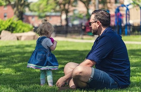 parent with child in park